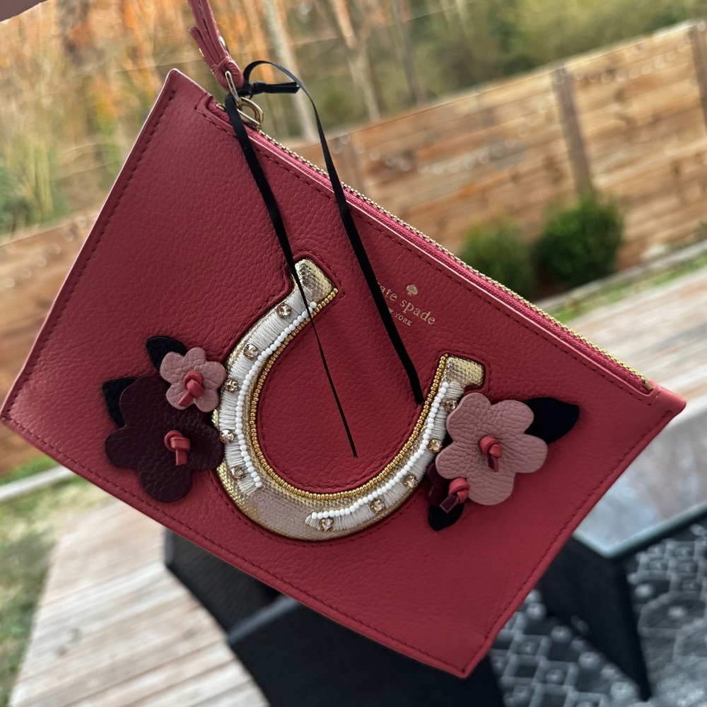 Kate Spade Pink Wristlet with Horseshoe and Floral Design